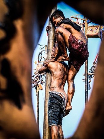 Greasy pole climb: photograph by Dhani ilham