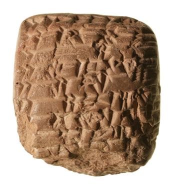 Cuneiform Clay Tablet Scribe: photograph by Original author unknown. Translation help provided by Manuel Molina.