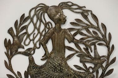 Haitian Oil-Drum Metal Cut-Out Art: photograph by Alex Proimos