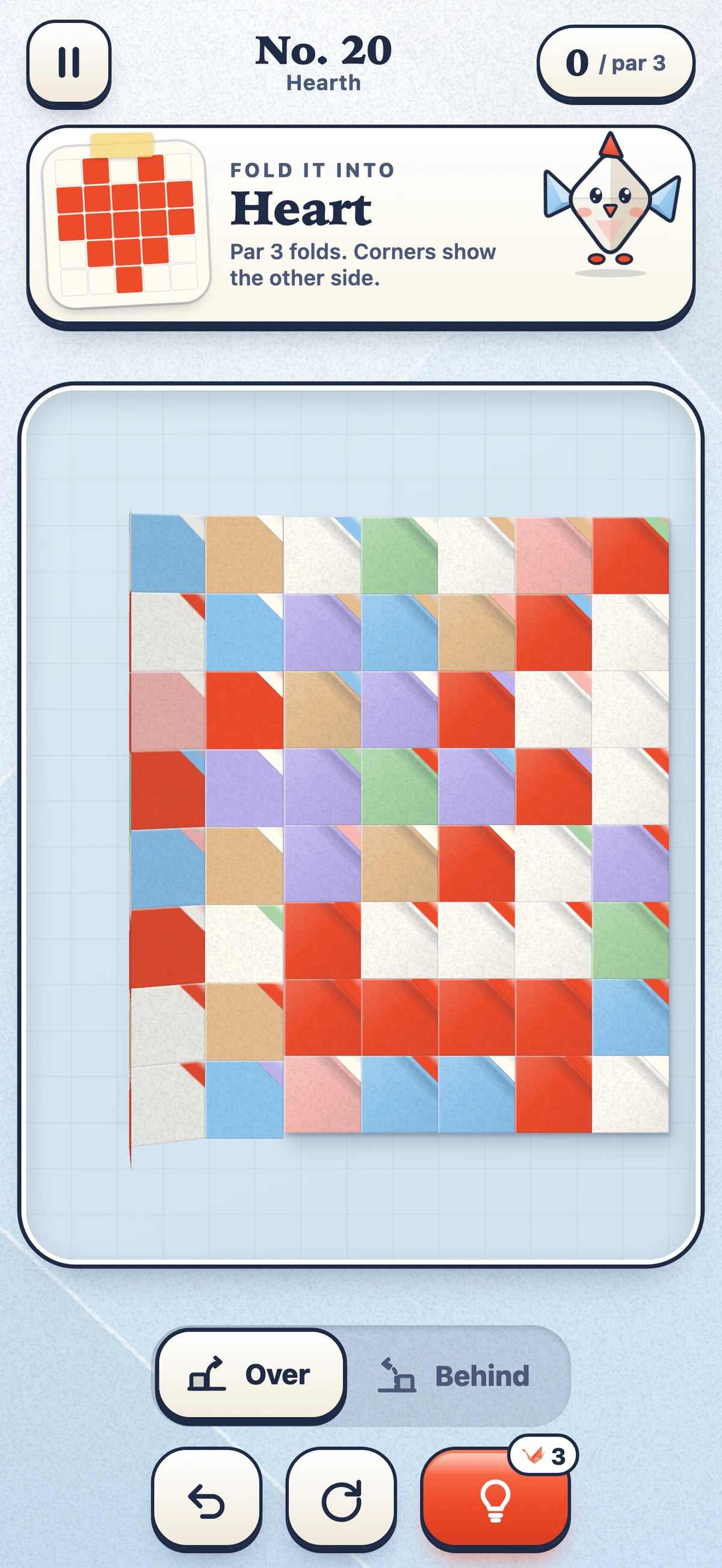 A sheet of paper being folded over a crease