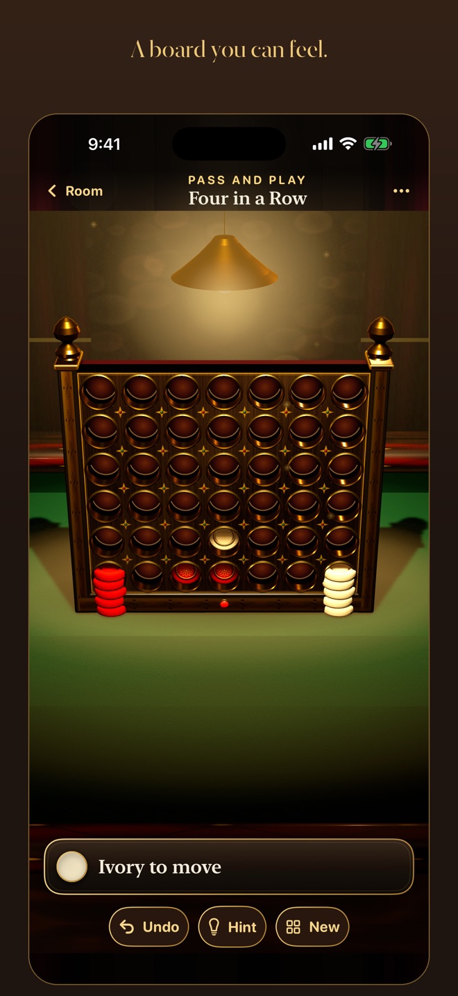 Four in a Row at the brass and walnut board
