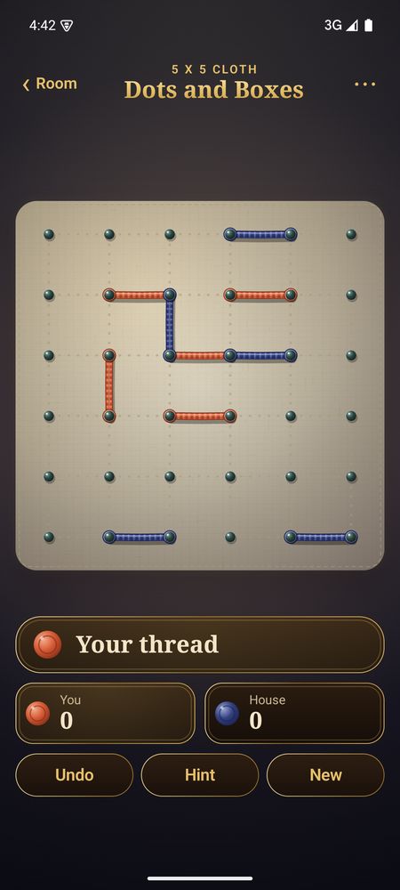 Dots and Boxes mid-game on the linen cloth